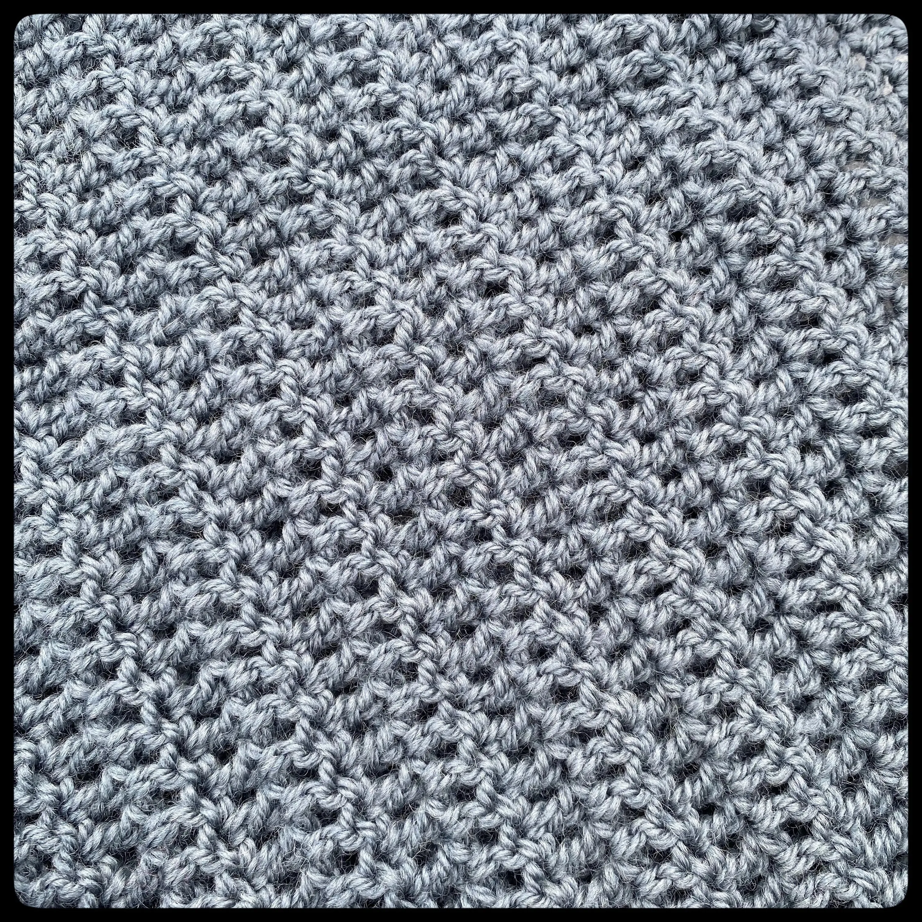 "Eyelet" wool baby blanket